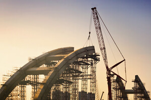 https-globalinfrastructurebloglegacy-squirepattonboggsblogs-com-wp-content-uploads-sites-44-2023-06-bridge-building-1-jpg