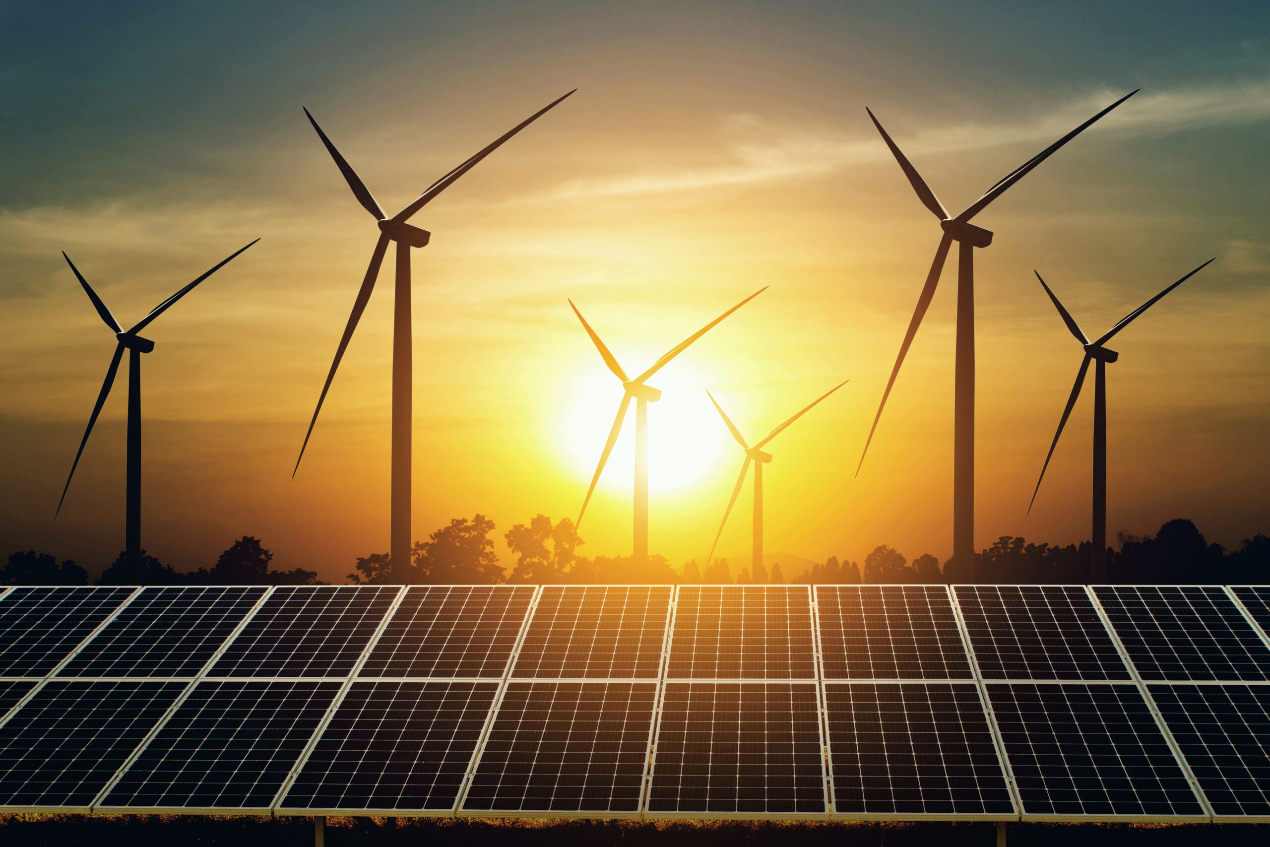 solar panel and turbine with sunset background. clean energy power in nature concept