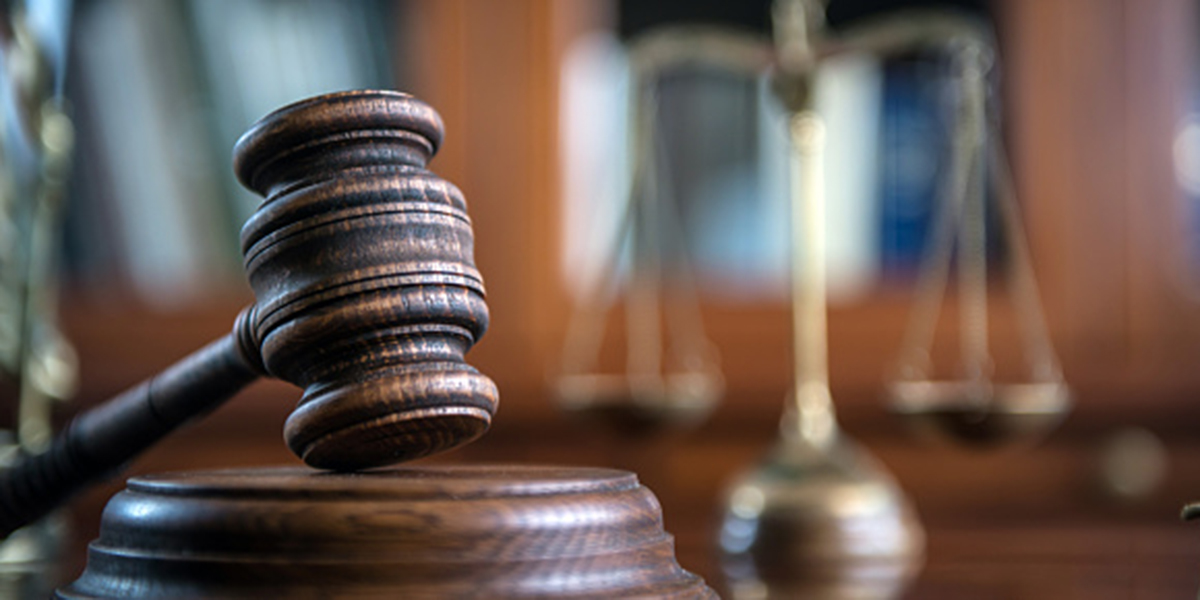 Law and Justice concept. Mallet of the judge, books, scales of justice.