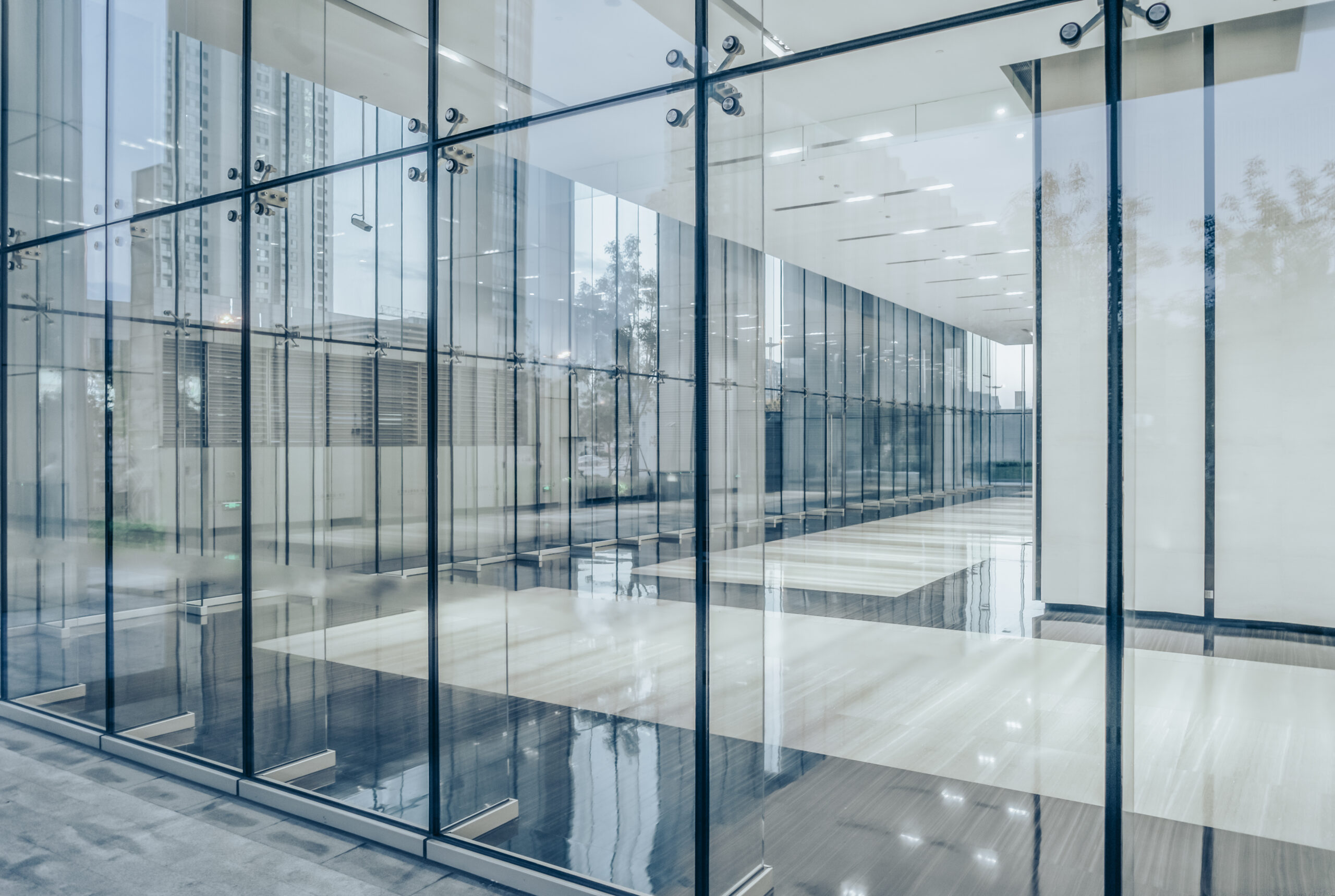 City skyline through office building