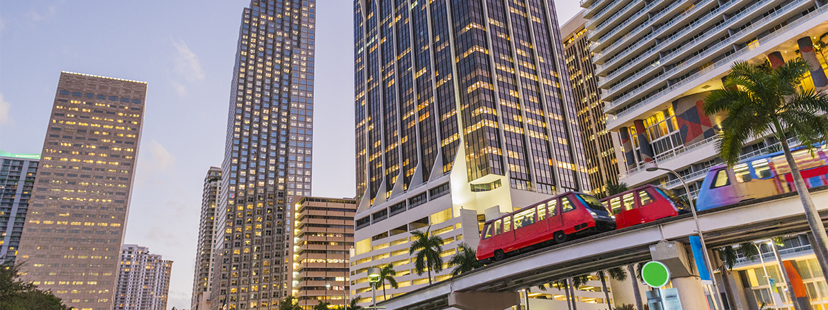 Downtown Miami City Buildings Illuminated at Dusk