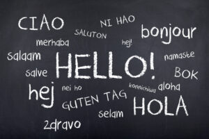 Hello in different languages word cloud on blackboard