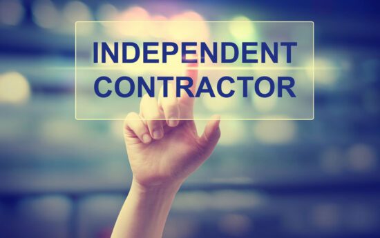 75506577 - independent contractor concept with hand pressing a button
