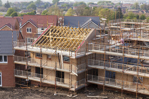 https-globalinfrastructurebloglegacy-squirepattonboggsblogs-com-wp-content-uploads-sites-44-2024-02-new-homes-under-construction-istock-180825420-jpg
