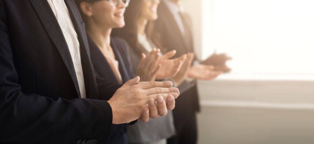 gambrell professionalism awards, Closeup of business people hands clapping at conference