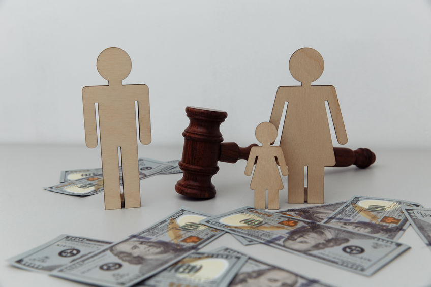 Separation or divorce concept. Family figures and judge gavel