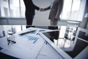 Handshake and ipad