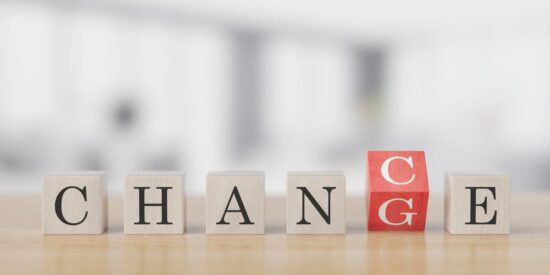 Business concept text CHANGE CHANCE cubes on office blured backg