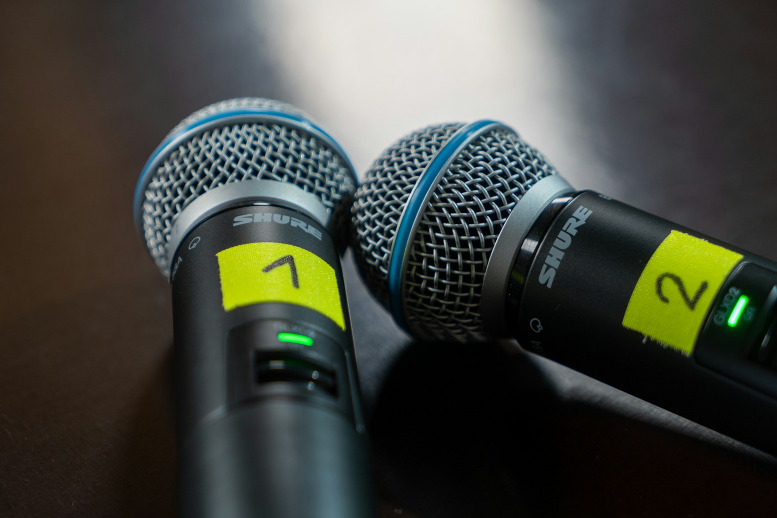 Two microphones used for a panel discussion.