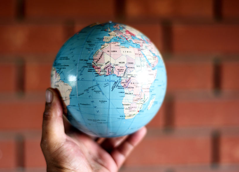 Planet Earth Globe and Human Hand