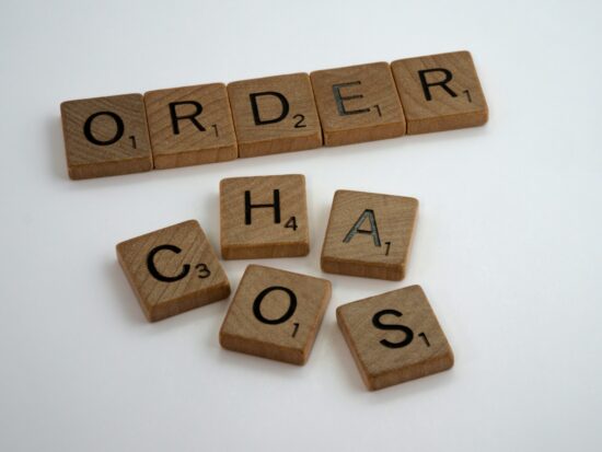 scrabble, scrabble pieces, lettering, letters, wood, scrabble tiles, white background, words, quote, order, chaos, disorder, oranise, disorganised, untidy,