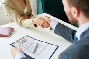 https-www-hpindiana-law-business-blog-wp-content-uploads-2025-04-business-people-shaking-hands-over-contract-961525934_727x484-300x200-jpeg