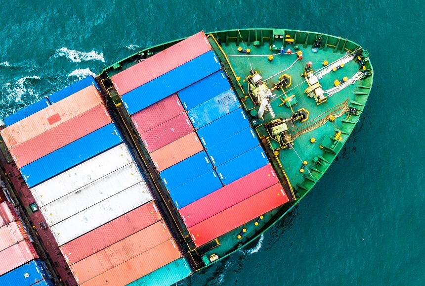 Aerial top view container cargo ship, Business logistic and transportation of International by ship in the open sea.