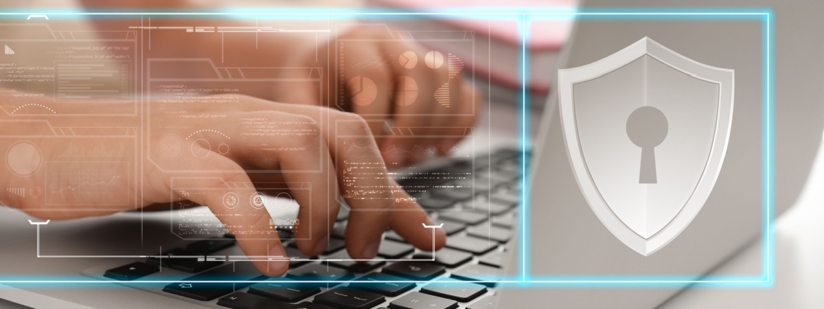 Child safety online. Little kid using laptop at home. Illustration of internet blocking app-Shutterstock_1841611093