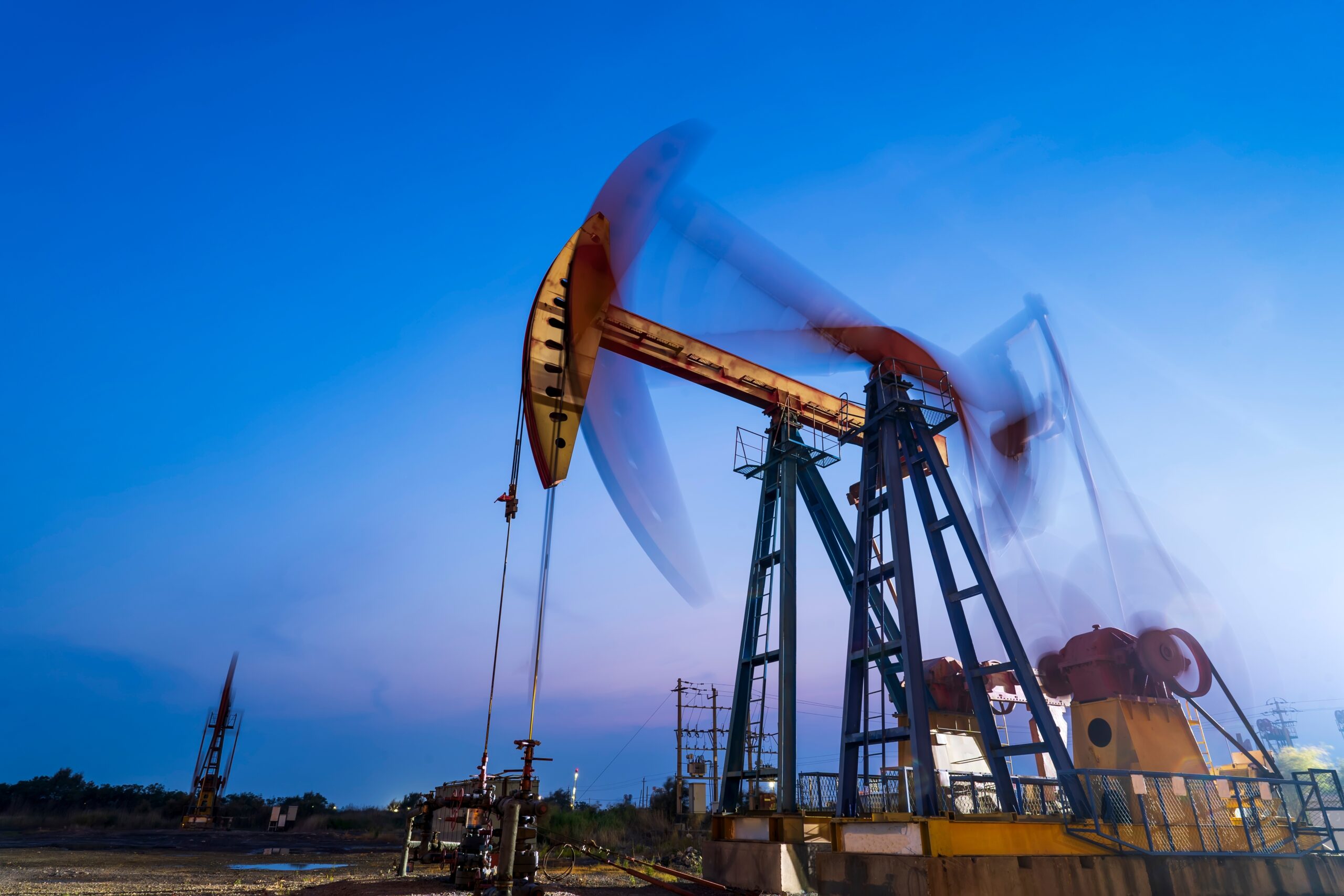 Oil,Field,,In,The,Evening,Of,Oilfield,Derrick