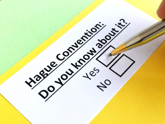 One,Person,Is,Answering,Question,About,Hague,Convention.