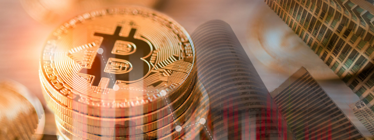 Close up bitcoin and digital stock market graph bar on black. Cryptocurrency. Bitcoin Stock Growth-Shutterstock_2156024949