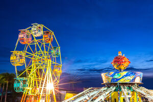 https-www-pensionsandbenefits-blog-wp-content-uploads-sites-16-2025-06-ferris-wheel-and-gravity-maching-in-movable-amusement-park-jpg