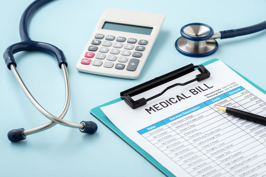 Medical bill concept on blue background
