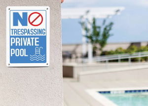 https-hoalaw-tinnellylaw-com-wp-content-uploads-sites-26-2025-08-hoa-pool-trespassing-300x215-png