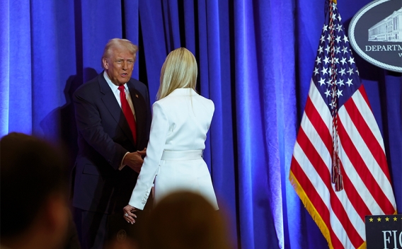 Attorney General Pamela Bondi shakes hands with President of the United States Donald J. Trump in the Great Hall at the Department of Justice.