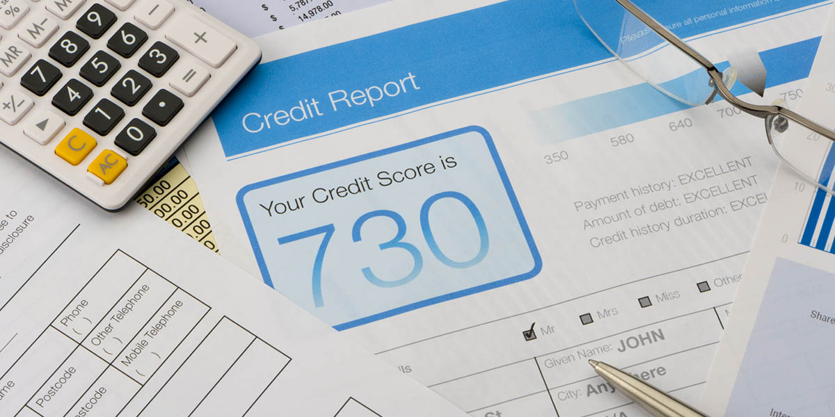 Credit report form on a desk with other paperwork.