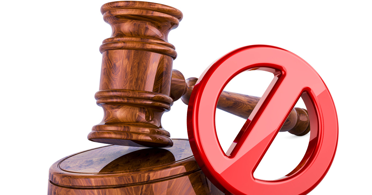 Stock Image of a No Symbol before Gavel