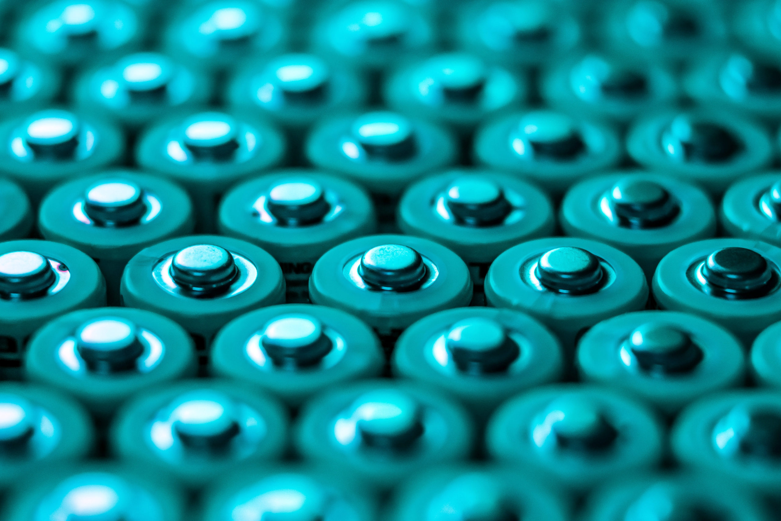 many lithium batteries under green light