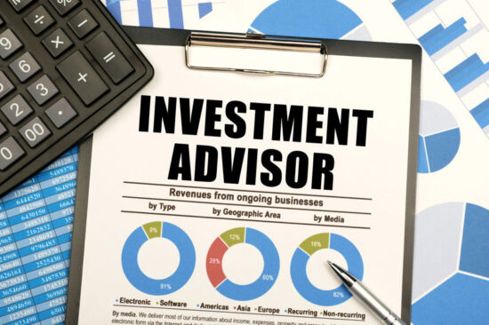 On the reporting documents, there are office items and a tablet with documents and the inscription - Investment advisor