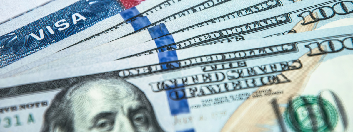 American visa in passport. Entry and Immigration Permits-Shutterstock_1963520569