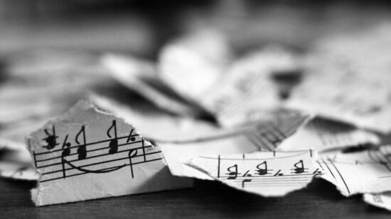 Torn musical notes, pieces of paper