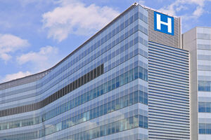 Building with large H sign for hospital