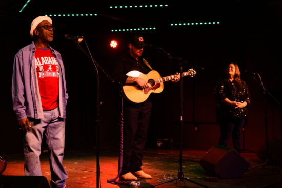 https-alabamaappleseed-org-wp-content-uploads-2025-11-jones-singing-jpg