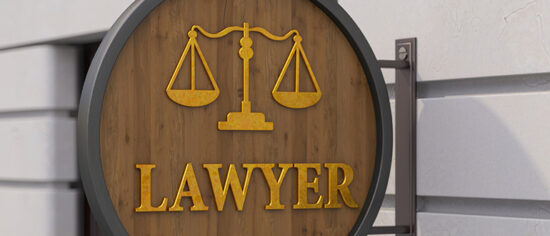 Lawyer Sign on Building's Wall. Law Office