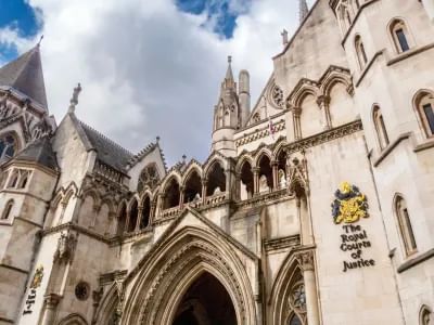 https-esquireglobalcrossings-squirepattonboggsblogs-com-wp-content-uploads-sites-21-2025-11-the-royal-courts-of-justice-in-the-strand_gettyimages-2173527119-jpg