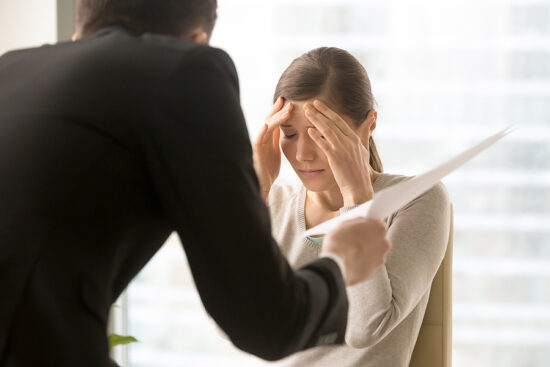 https-www-njemploymentlawfirmblog-com-files-2025-11-bigstock-stressed-millennial-woman-list-227492101-jpg