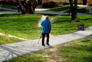 https-www-michaelgeist-ca-wp-content-uploads-2025-11-older-man-reaching-people-045010-300x201-jpg