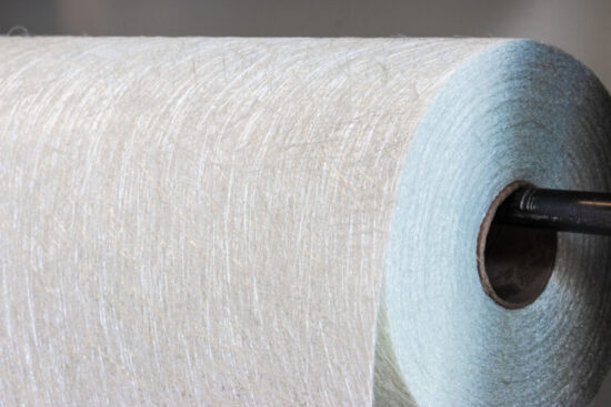 https-publicfinancetaxblog-squirepattonboggsblogs-com-wp-content-uploads-sites-18-2025-11-fiberglass-fabric-composite-roll-gettyimages-1067644492-1-745x497-jpg