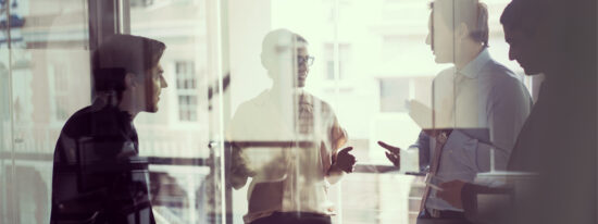 Business people having discussion in modern office
