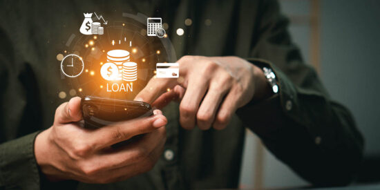 Online personal loan and financial concept. Financial loan agreement, Personal or business loans through online services between lenders and borrowers. Person using laptop laptop with loan icon.