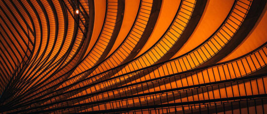 Overlapping-Black-Balconies-on-Red-Wall_PPT