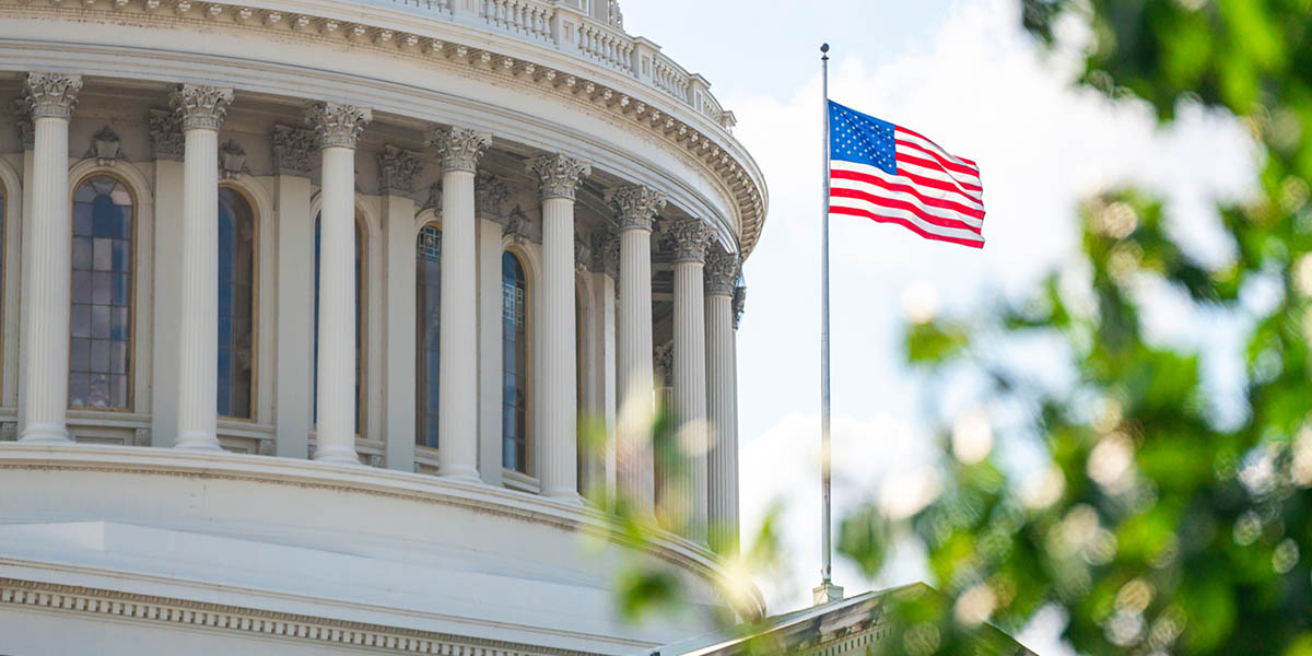 Close-up view of the American Flag on the U.S. Capitol building in Washington D.C. on the East Facade