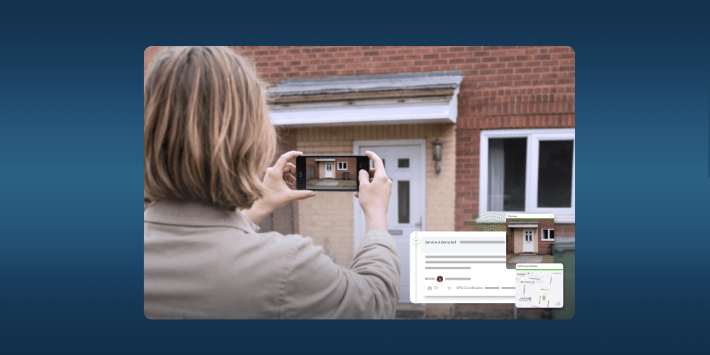 Process server taking photo of a house