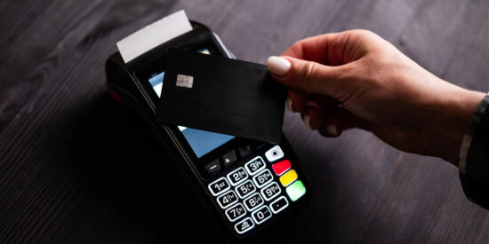 Girl Paying By Credit Card With Wireless Pos Terminal