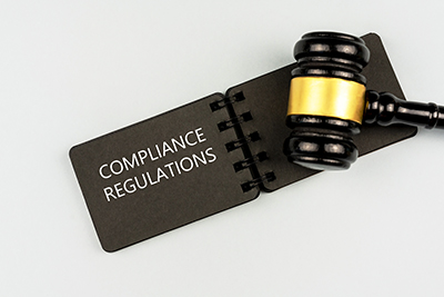 Black Gavel With Paper With Text Compliance Regulations
