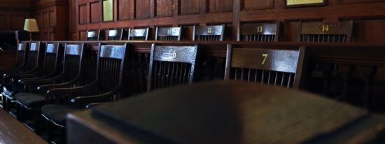 jury box courtroom Shutterstock_1132288550