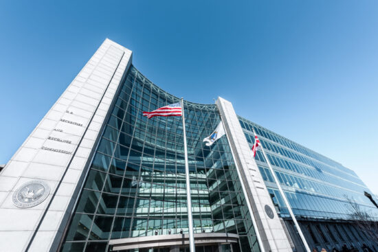 US United States Securities and Exchange Commission SEC entrance architecture modern building sign, entrance, american flag, looking up sky, glass windows reflection