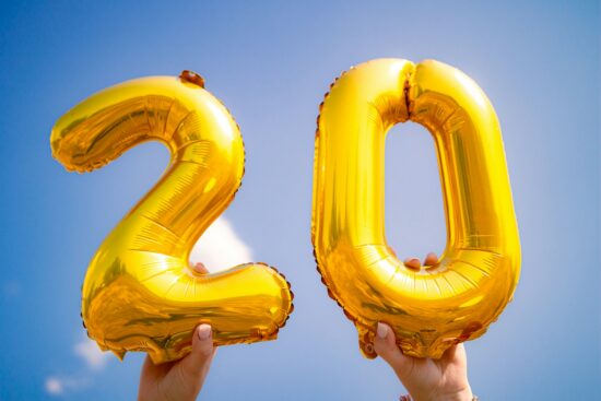 Golden 20 lifted into the air. Find this one and others like it on Adobe Stock