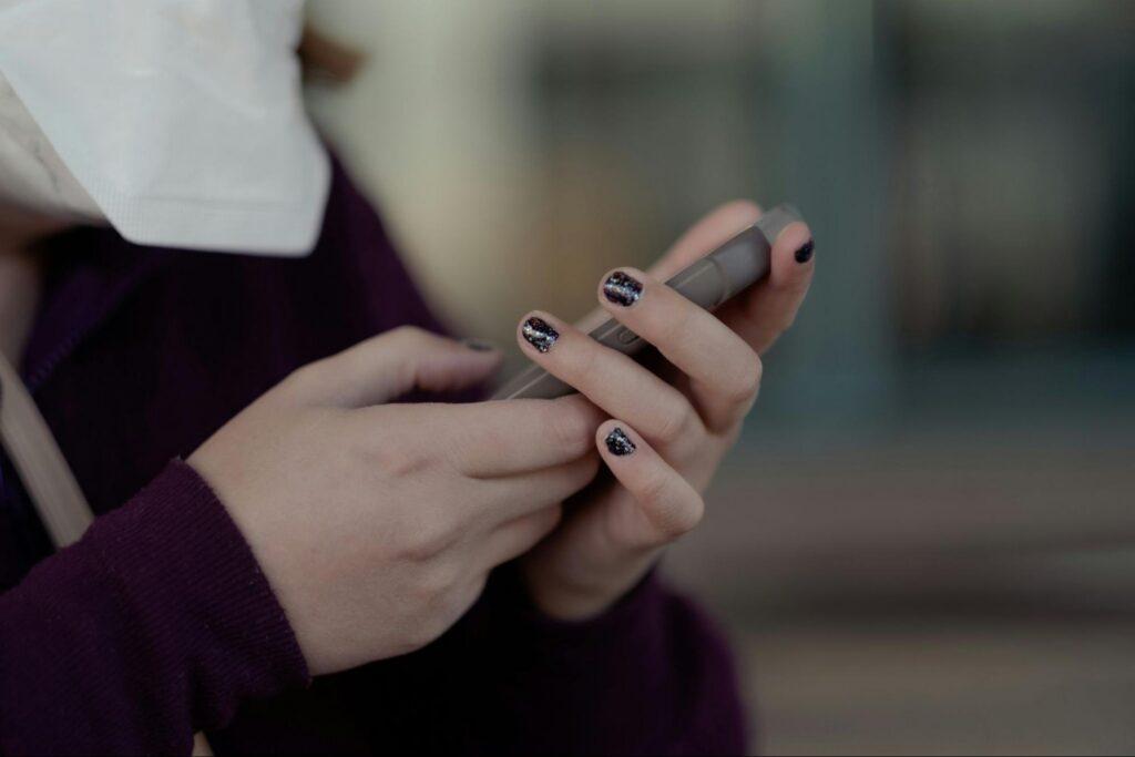 Prospective client using a law firm website on a mobile phone