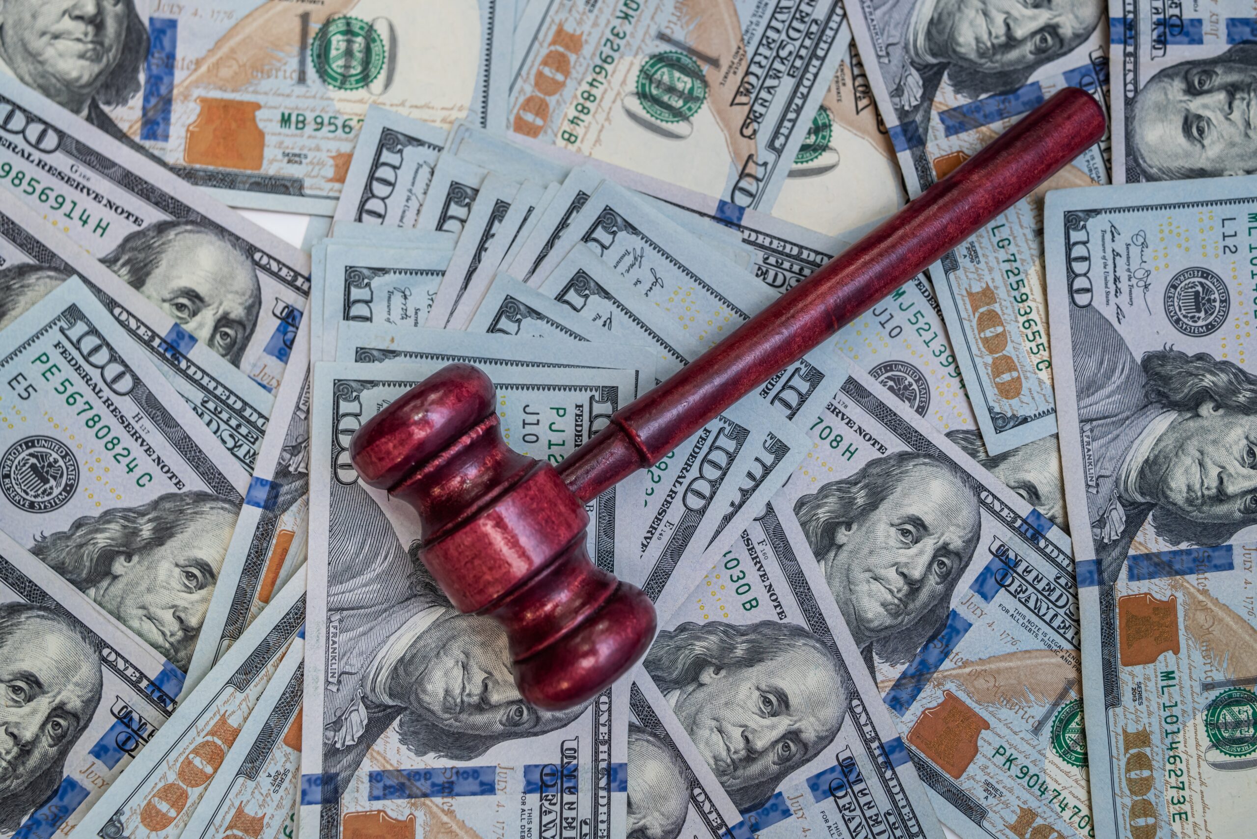 Judicial,Gavel,On,Us,Dollars,Background,For,Business,Arbitration,And